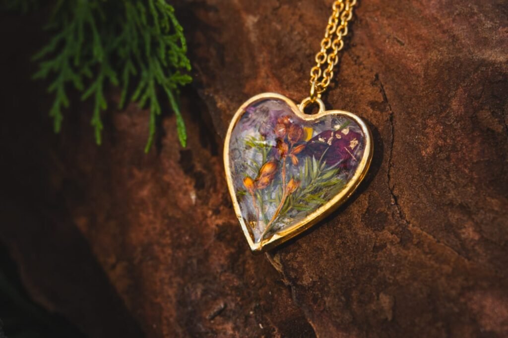 Handmade floral resin heart necklace by Darya