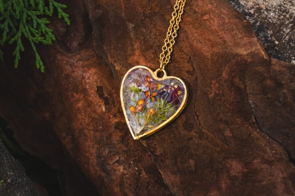 Handmade botanical resin heart necklace by Darya