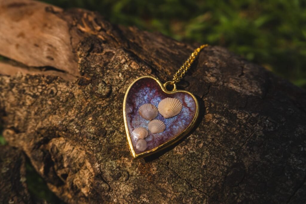 Handmade shell resin heart necklace by Darya