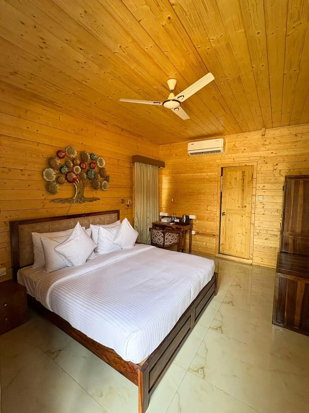 Wooden cabin room at the premium stay in North Goa